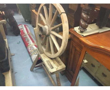 19th century pine bench and cartwheelCondition report: It would need treating if it was going outside