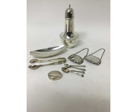 Small group of silver to include a dish by A.E. Jones, silver sugar castor, pair of silver spirit labels, spoons and tongs.