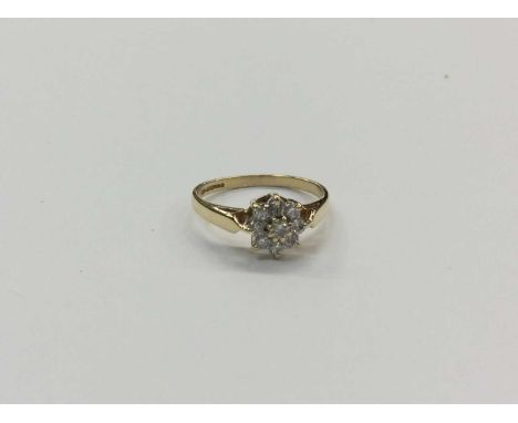 18ct gold diamond flower head cluster ring, size KCondition report: Weight 2.2g 