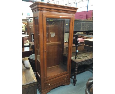 Modern Cherry wood display cabinet with bevelled glazed door, three adjustable shelves  and drawer on bracket feet 93 cm wide