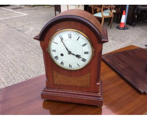 Victorian walnut cased mantel clock with white enamel dial