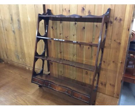 Georgian-style mahogany hanging four tier wall shelf with three drawers 69 cm wide, 93 cm high 17 cm deep