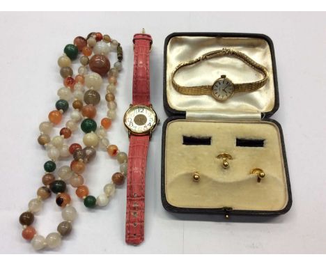 9ct gold ladies Tissot wristwatch on 9ct gold bracelet, Orvis wristwatch, two 9ct gold studs and one other gold plated and a 