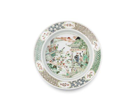 A famille verte basin19th centuryPainted with a central scene of ladies in boats gathering lotus flowers with further figures