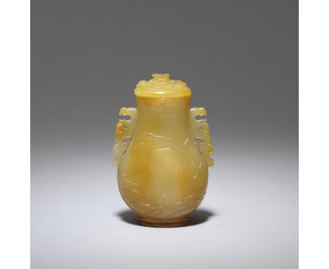 A yellow agate archaistic 'Scholars' vase and cover18th/19th centuryThe translucent, yellow stone carved as a well-hollowed, 