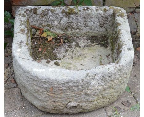 Semi-circular stone trough