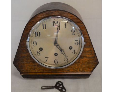 Art Deco mantel clock in an oak case with a Westminster chime maker Gufa West Germany