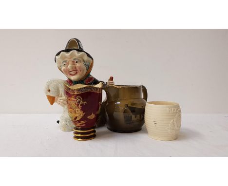 SHORTER POTTERY FIGURINE OF MOTHER GOOSE
a Ridgway jug, Carlton Ware Rouge Royale vase, Burleigh Ware jug, Lovatt's Langley W