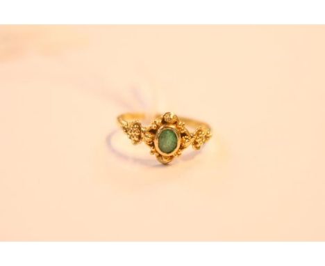 18ct Gold Emerald set Asian design ring Size M. 2.5g total weight 
