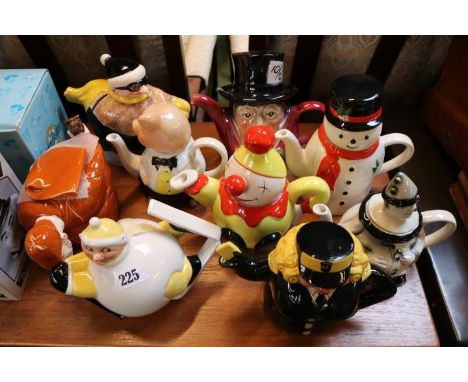 Collection of assorted Novelty Teapots to include Carltonware Traffic Warden, Tony Wood etc.
