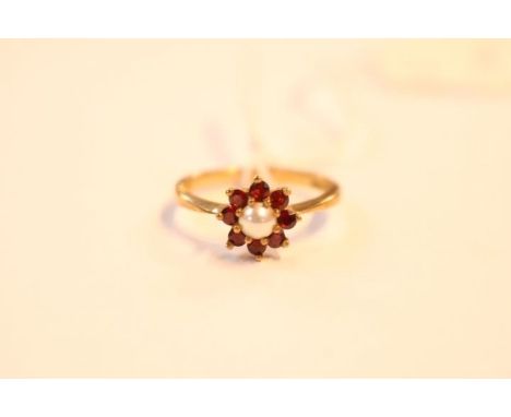 Ladies 9ct Gold Pearl and Ruby set Daisy design ring Size N. 2.3g total weight 