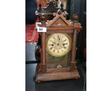 Oak Cased bracket clock with roman numeral dial 