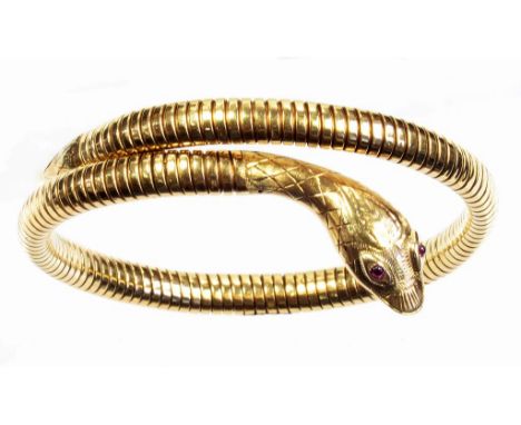 A VICTORIAN GOLD ARTICULATED SNAKE BANGLE, WITH RED CABOCHON EYES, 22G