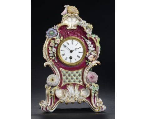 A COALPORT STYLE CLARET GROUND FLORAL ENCRUSTED CLOCK, C1840  with French timepiece, 35cm h ++In good condition with some typ