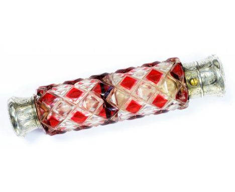 A VICTORIAN SILVER MOUNTED, DOUBLE ENDED RUBY FLASHED AND CUT GLASS COMBINATION SCENT AND SALTS BOTTLE, 13.5CM L, C1880, FAUL