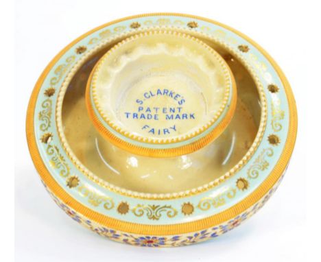 A RARE TAYLOR, TUNNICLIFFE & CO EARTHENWARE CLARKES FAIRY LIGHT STAND, THE TEXTURED SIDES PAINTED WITH FLOWERS, 20CM DIAM, PR