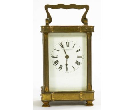 A FRENCH BRASS CARRIAGE CLOCK, THE ENAMEL DIAL INSCRIBED SHAPMAN D NEILL LTD BELFAST, THE TIMEPIECE WITH REPLACEMENT ESCAPEME