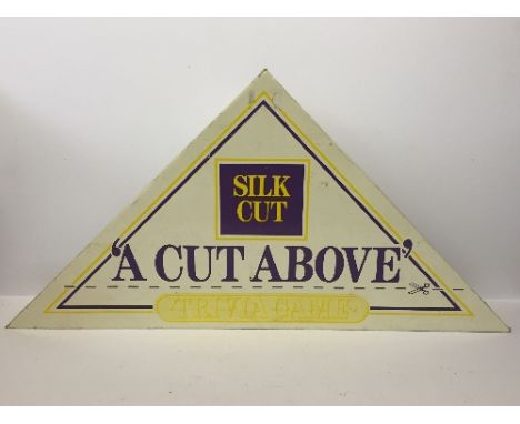 Silk Cut 'A Cut Above' Trivia Game, consisting of fold out diamond shaped plastic playing board, a quantity of Trivia cards, 