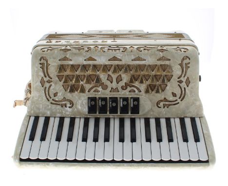 Brandoni 120 bass piano accordion, with five treble couplers (one a musette), two bass couplers, white marbled finish, case 