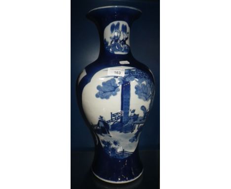 A LARGE CHINESE BLUE AND WHITE VASE, decorated with figures in landscapes