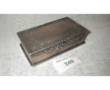 A WILLIAM IV TABLE SNUFF BOX of rectangular form, with a raised foliate border, the cover with chased foliate decoration with