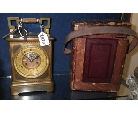 ELKINGTON: A BRASS-CASED TRAVELLING CLOCK BAROMETER, the sunken dial with visual escapement, surrounded by a gilt chapter rin