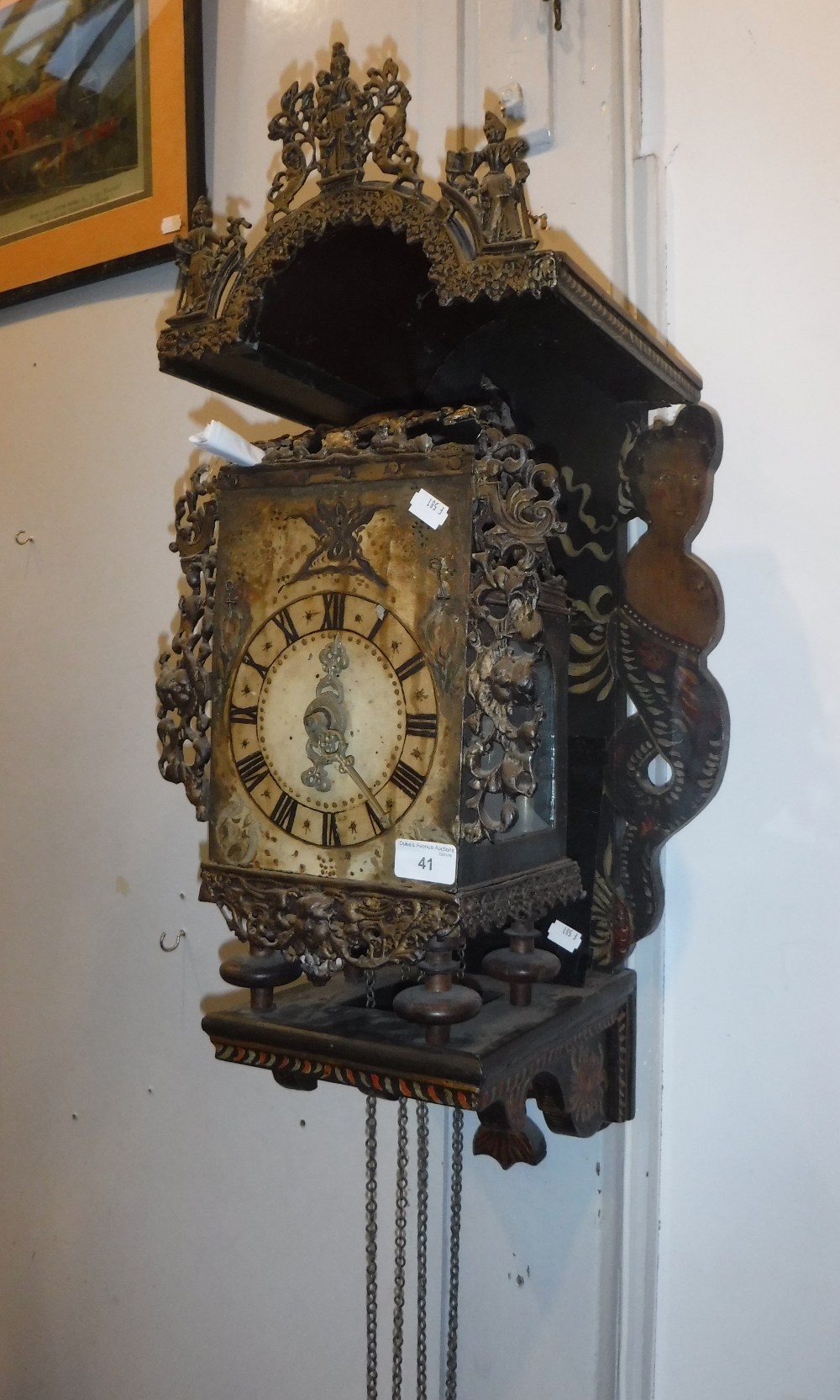 A 17TH CENTURY STYLE DUTCH WALL CLOCK with lantern clock movement and