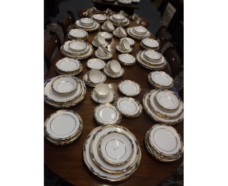 AN EXTENSIVE COLLECTION OF SPODE DINNER AND TEA WARE with blue and gilt borders pattern no 9688