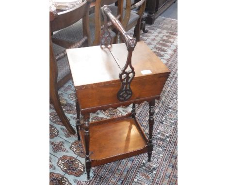 AN AMERICAN WALNUT WORKBOX, EAST COAST,  with an articulated handle on splayed legs with shelf stretcher 19th century 16" wid