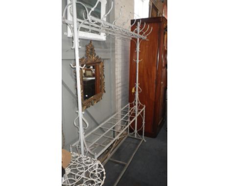 A GOTHIC STYLE WROUGHT-IRON COAT AND STICK STAND, 60" long