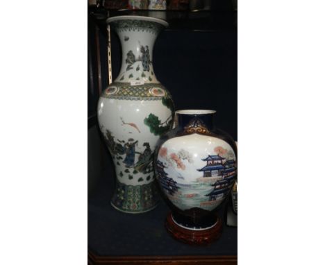 TWO CHINESE VASES, the larger with figures in a landscape within green and yellow borders