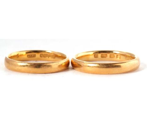 Two 22ct wedding bands: one hallmarked London 1928, size K, 4.1g, together with another hallmarked Birmingham 1914, 3.0g