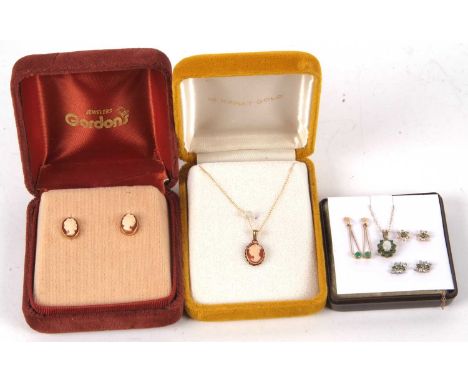 A quantity of gemset jewellery to include a 9ct opal and emerald pendant, three pairs of unmarked yellow metal and emerald ea