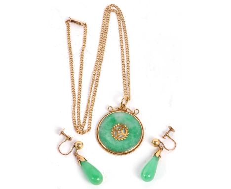 A jade and gold pendant and earrings, the round jade pendant with hole to centre, in gold mount stamped 18, 2.7cm diameter, 5