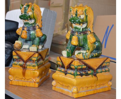 PAIR OF LARGE 26" CHINESE CERAMIC TEMPLE LIONS ON STANDS     