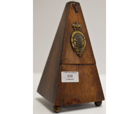 AN OLD WOODEN CASED METRONOME     