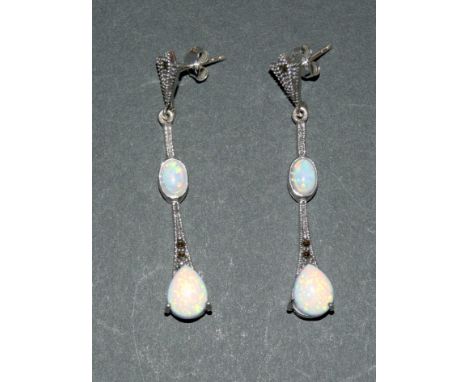 Pair of silver and opal drop earrings in the art deco style