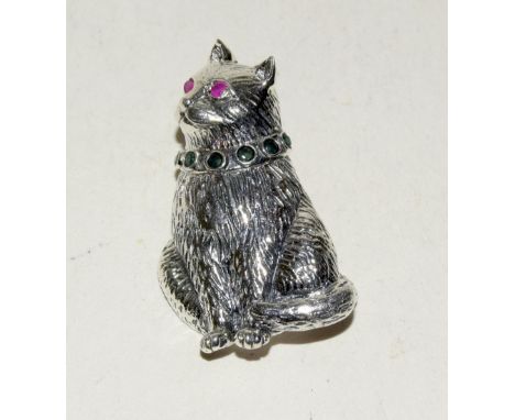 Silver cat brooch with ruby eyes and emerald collar