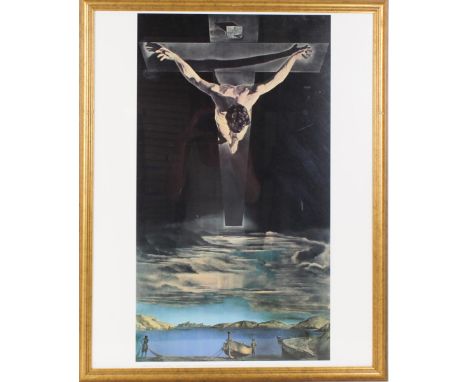 Framed poster of Christ on the cross by Salvador Dali. Words on the bottom say Christ of St. John of the Cross, Salvador Dali