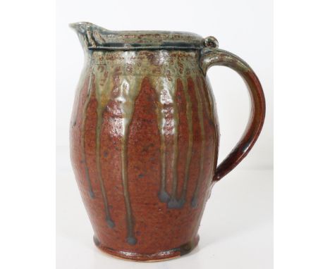 Tom Homann (b 1958) American Art Pottery Drip Pitcher, signed. Size: 7 x 4 1/2 x 8 in.