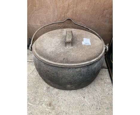 A LARGE VINTAGE CAST IRON COOKING POT 