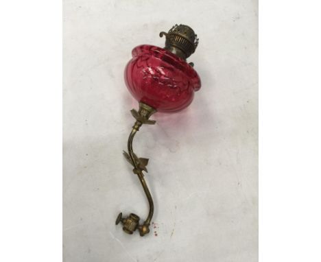 A CRANBERRY GLASS WALL OIL LAMP 
