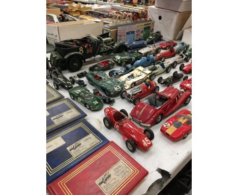 A LARGE COLLECTION OF VINTAGE RACING CAR MODELS AND SEVERAL PHOTO ALBUMS SHOWING MODEL DIARAMAS AND PHOTOS OF SOME OF THE MOD