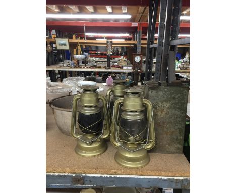 FOUR VINTAGE PARAFFIN LAMPS, A METAL JAM PAN AND A PETROL CAN 