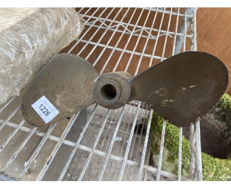 A SMALL VINTAGE BRASS PROPELLER 