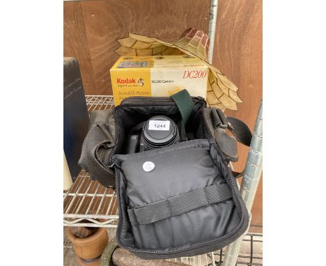 AN ASSORTMENT OF ITEMS TO INCLUDE A CANON EOS 100 CAMERA AND A TIFFANY STYLE LAMP SHADE ETC 