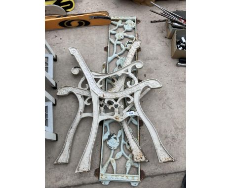 A PAIR OF VINTAGE CAST IRON BENCH ENDS AND FLORAL BENCH BACK 