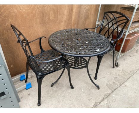 A VINTAGE CAST ALLOY BISTRO SET COMPRISING OF A ROUND TABLE AND TWO CHAIRS 