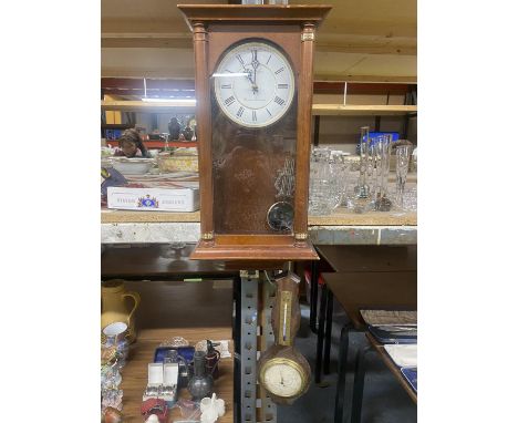 A MAHOGANY CASED WESTMINSTER-WHITTINGTON WALL CLOCK AND A BAROMETER 
