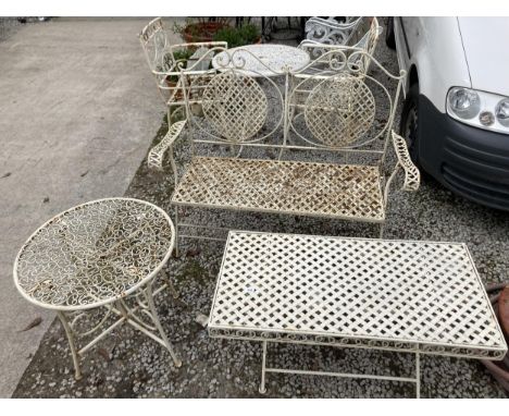 A DECORATIVE WROUGHT IRON PATIO FURNITURE SET TO COMPRISE OF A BENCH, A SMALL ROUND TABLE AND A COFFEE TABLE 